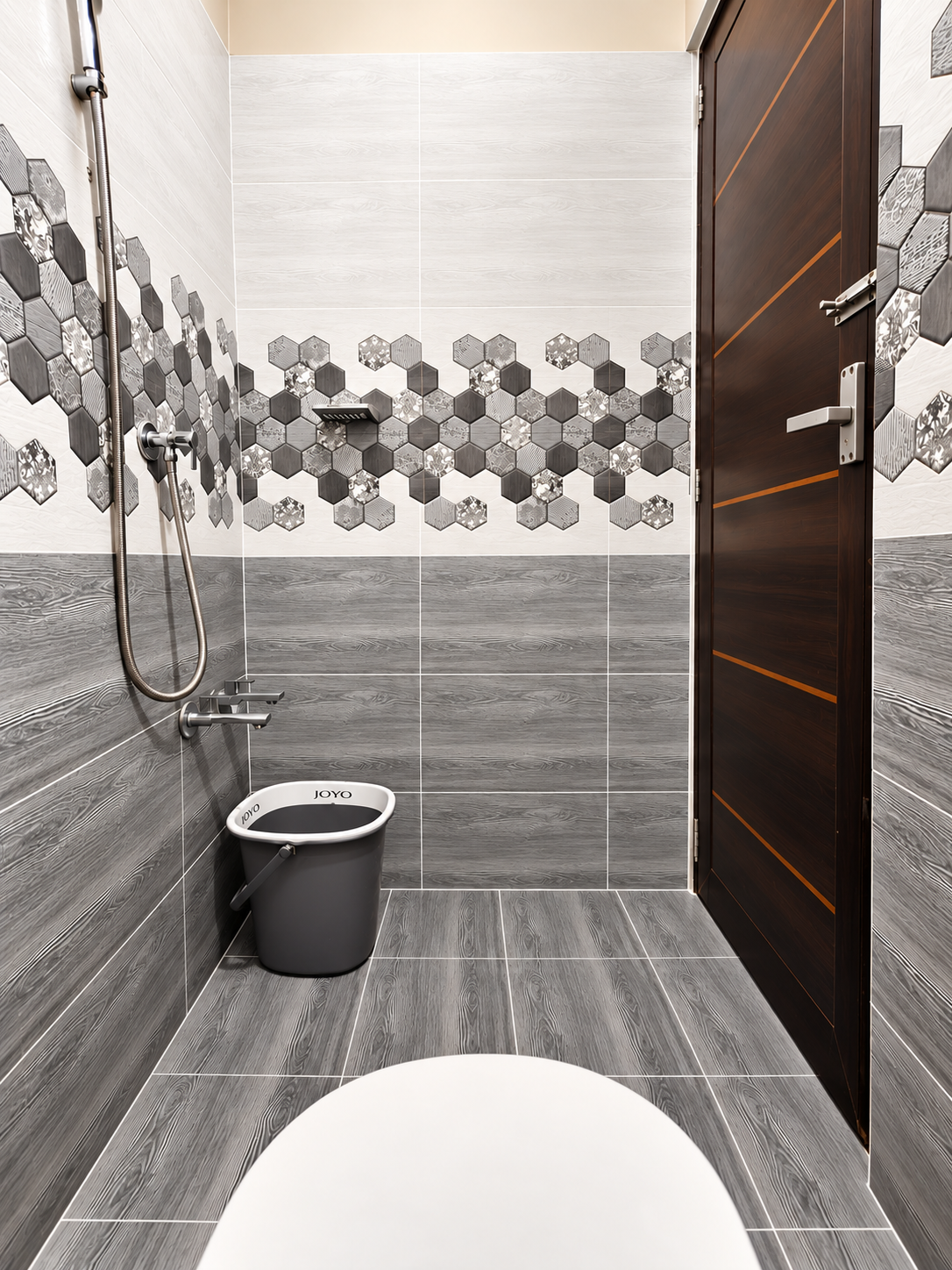 Bathroom with tiled walls and shower